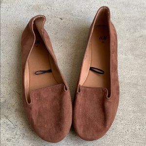 A cute pair of reddish brown flats